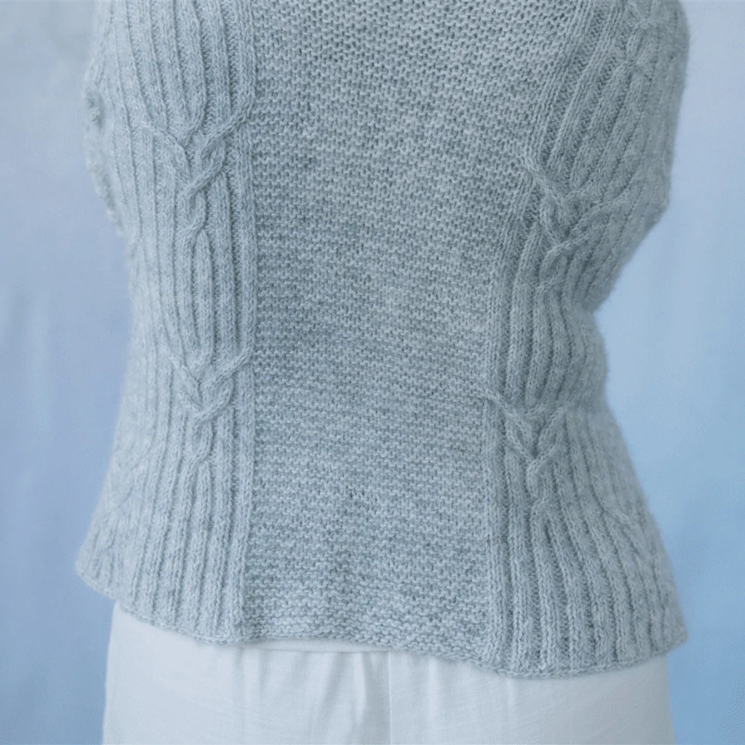 10449-cloudbusting-cabled-cardigan-1.webp