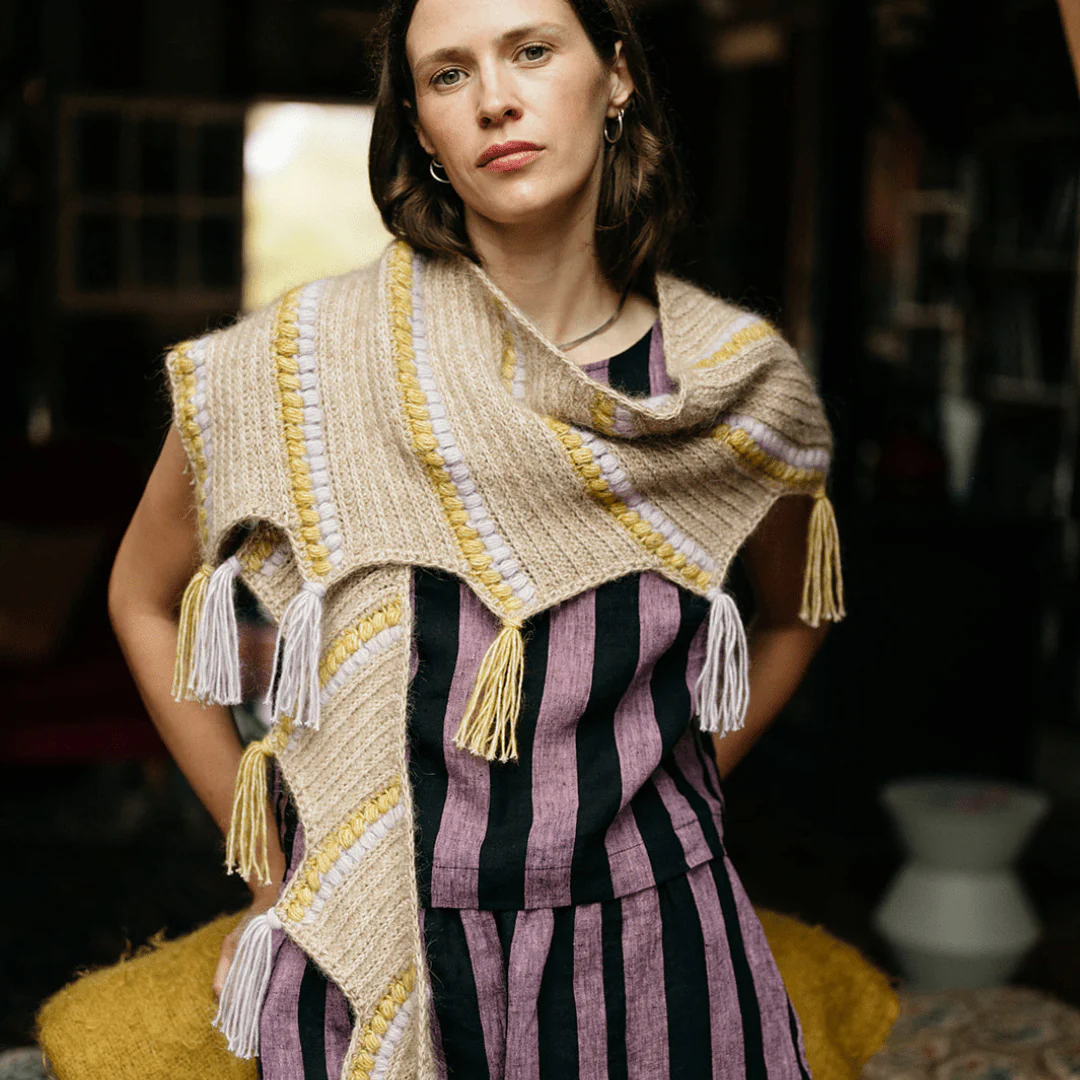 1451-calendula-shawl-wrap-with-bobbles-and-fringe-1.webp