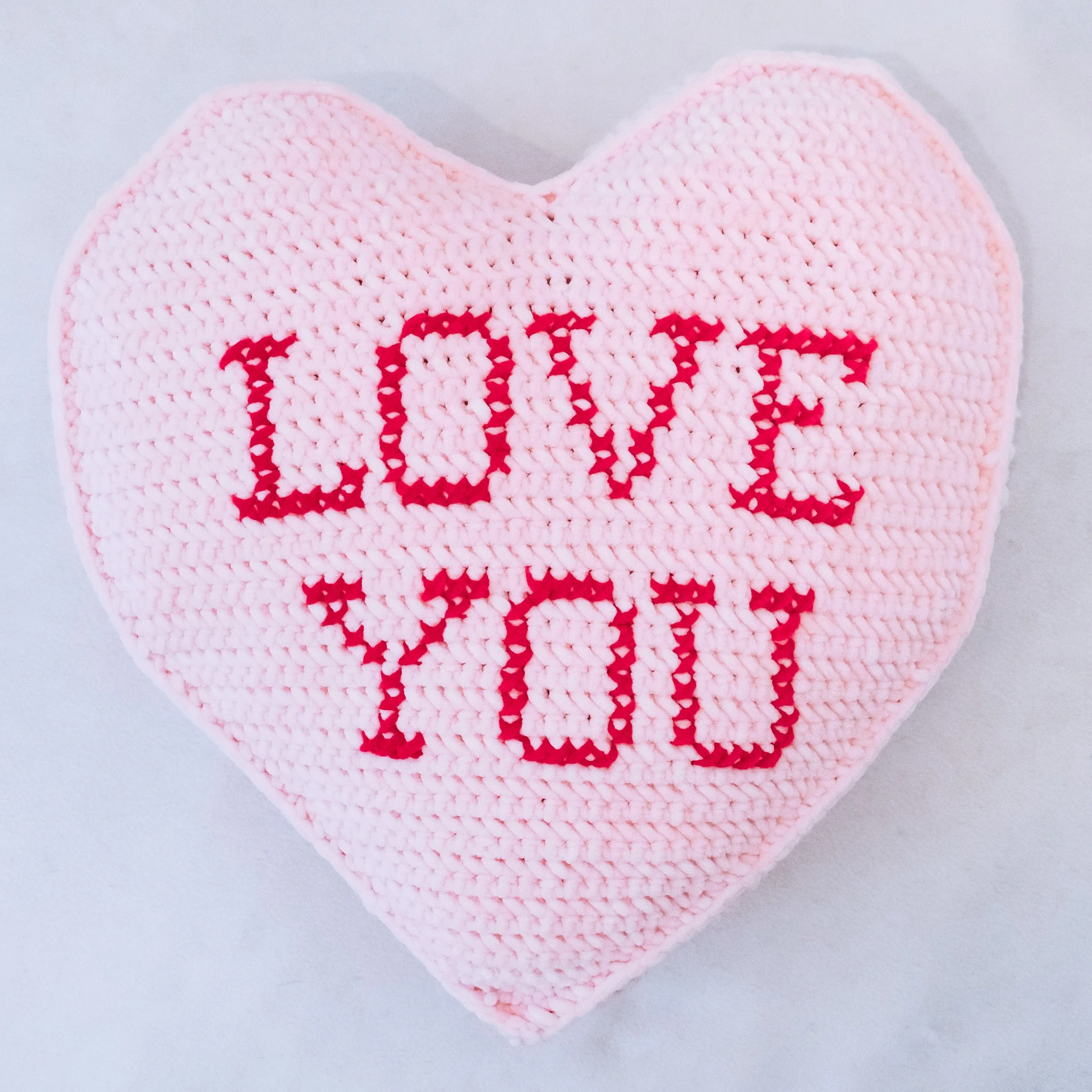 21622-candy-hearts-pillow-1.webp