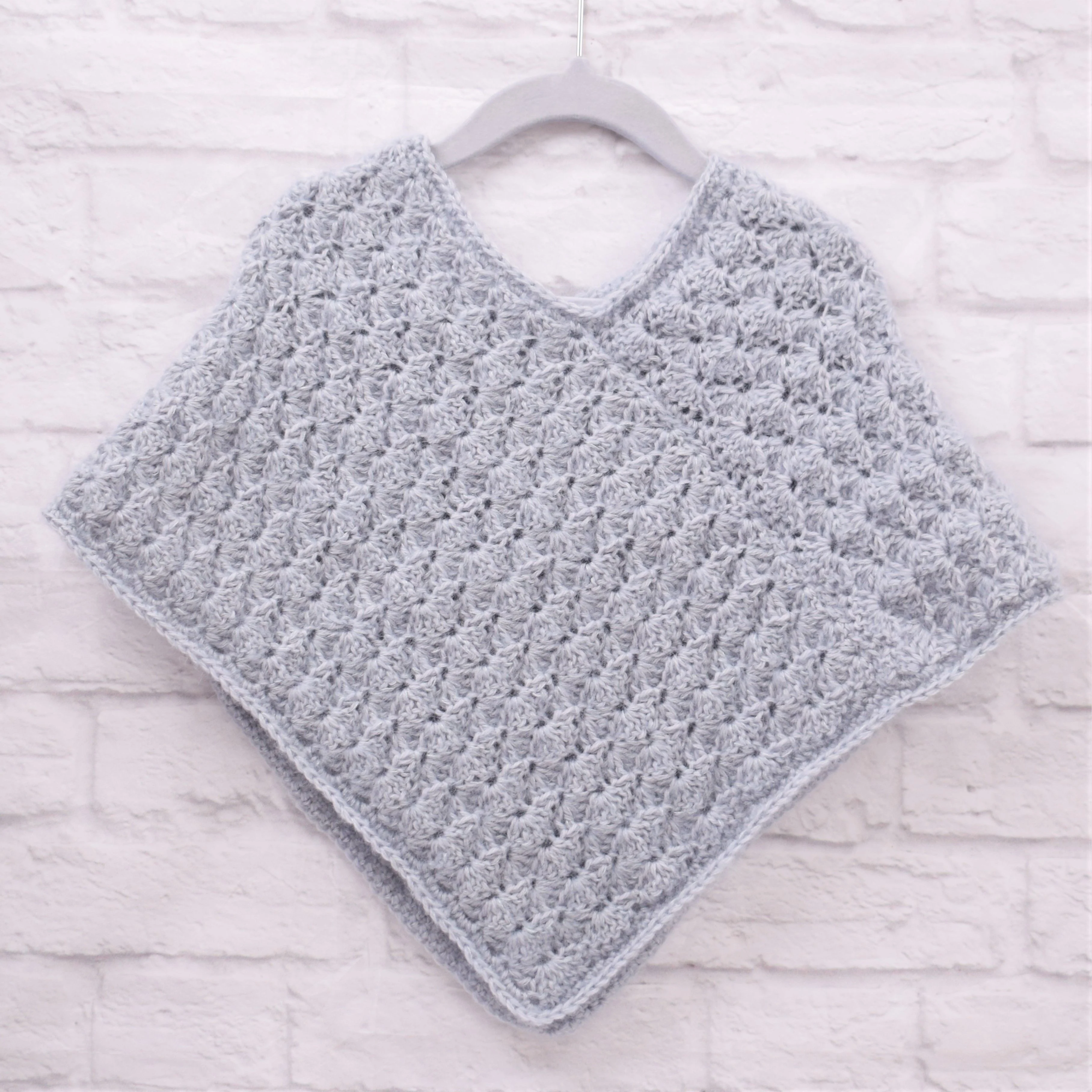 21636-winter-shells-poncho-child-evergreen-1.webp