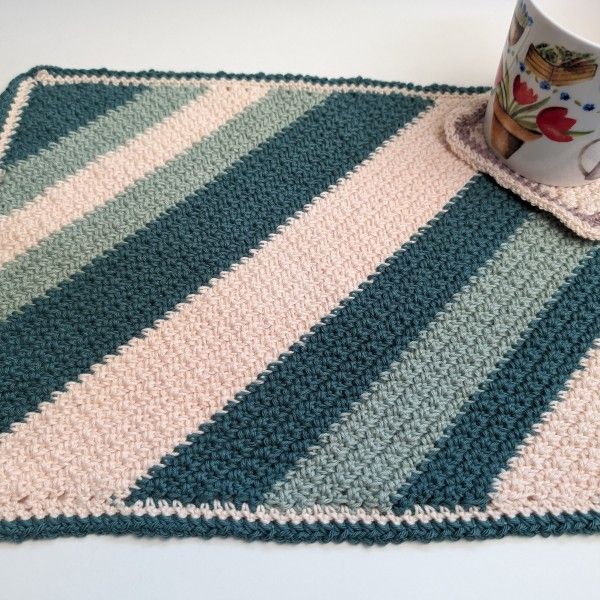 21689-crossed-placemat-and-coaster-set-1.jpg