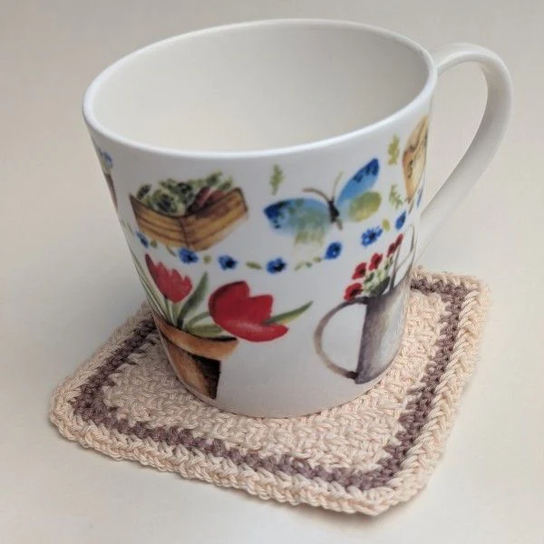 21689-crossed-placemat-and-coaster-set-1.jpg