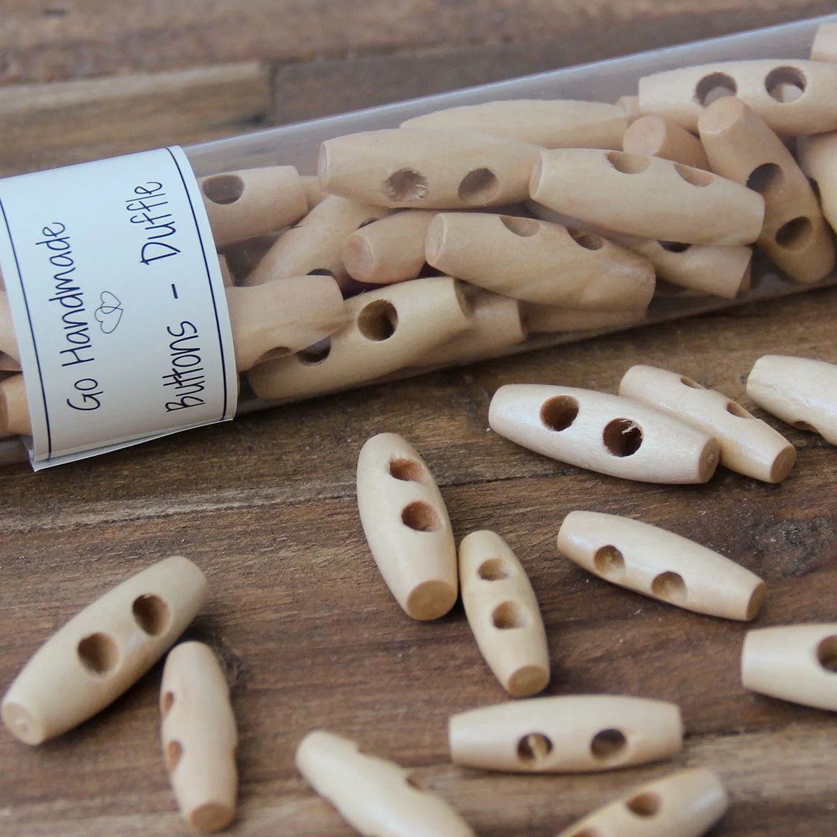 2407-oblong-wooden-buttons-30-mm-1-2-inches–1.webp