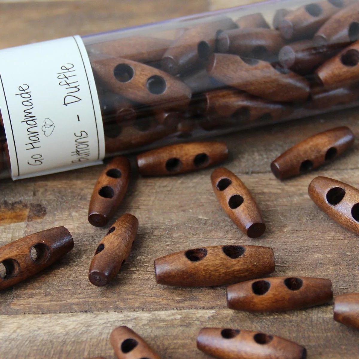 2407-oblong-wooden-buttons-30-mm-1-2-inches–1.webp