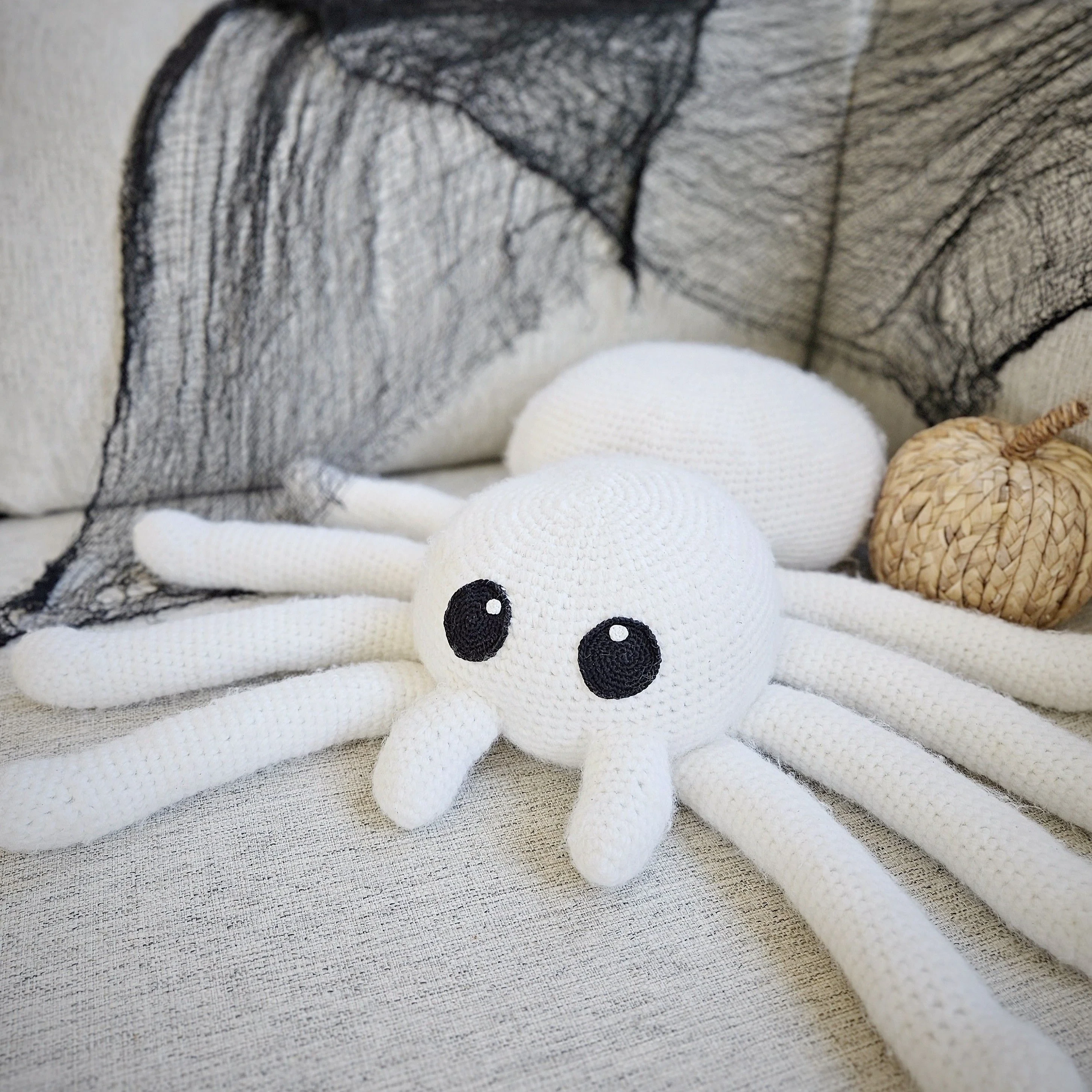 5594-couch-potato-spider-pillow-1.webp