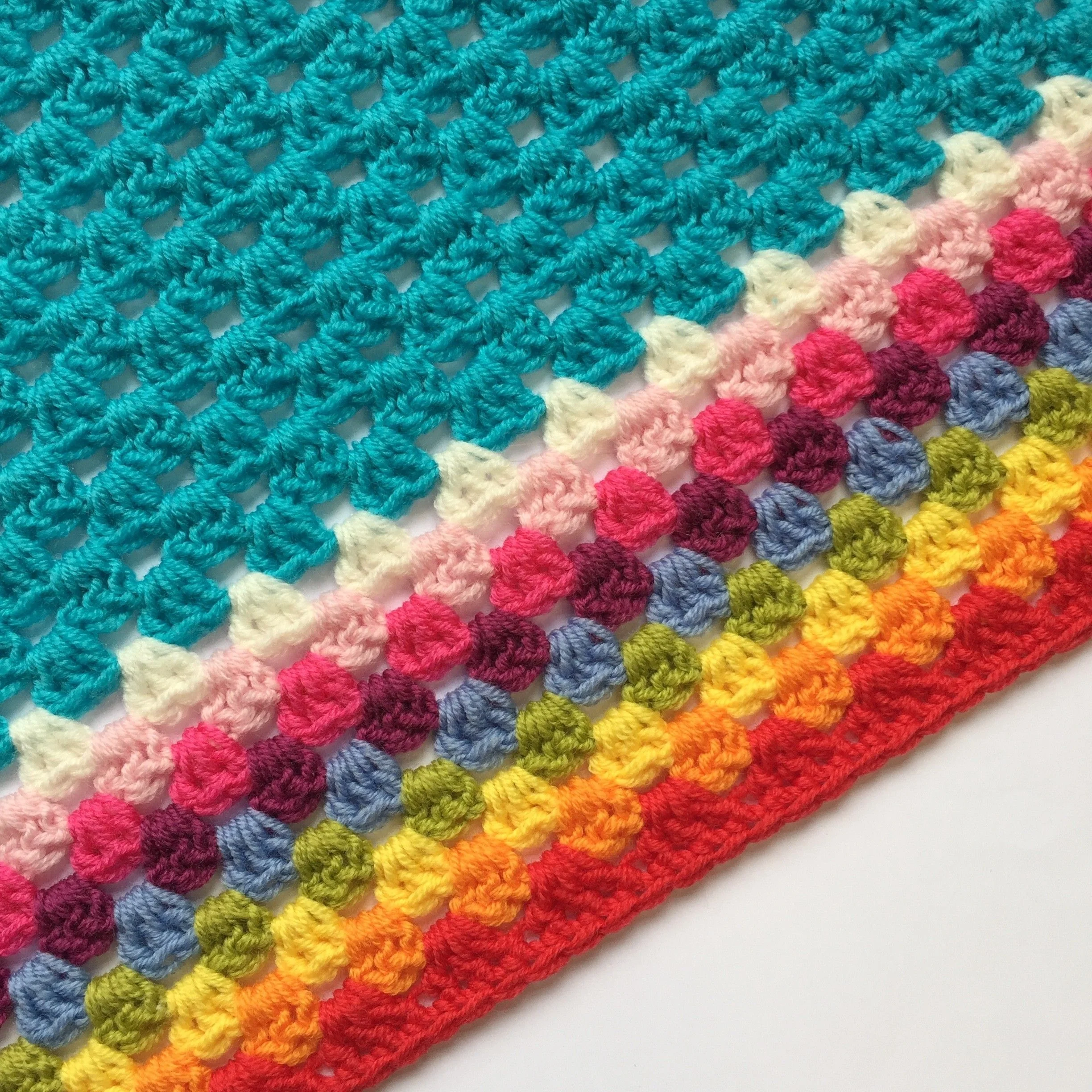 6368-rainbow-skies-small-blanket-1.webp