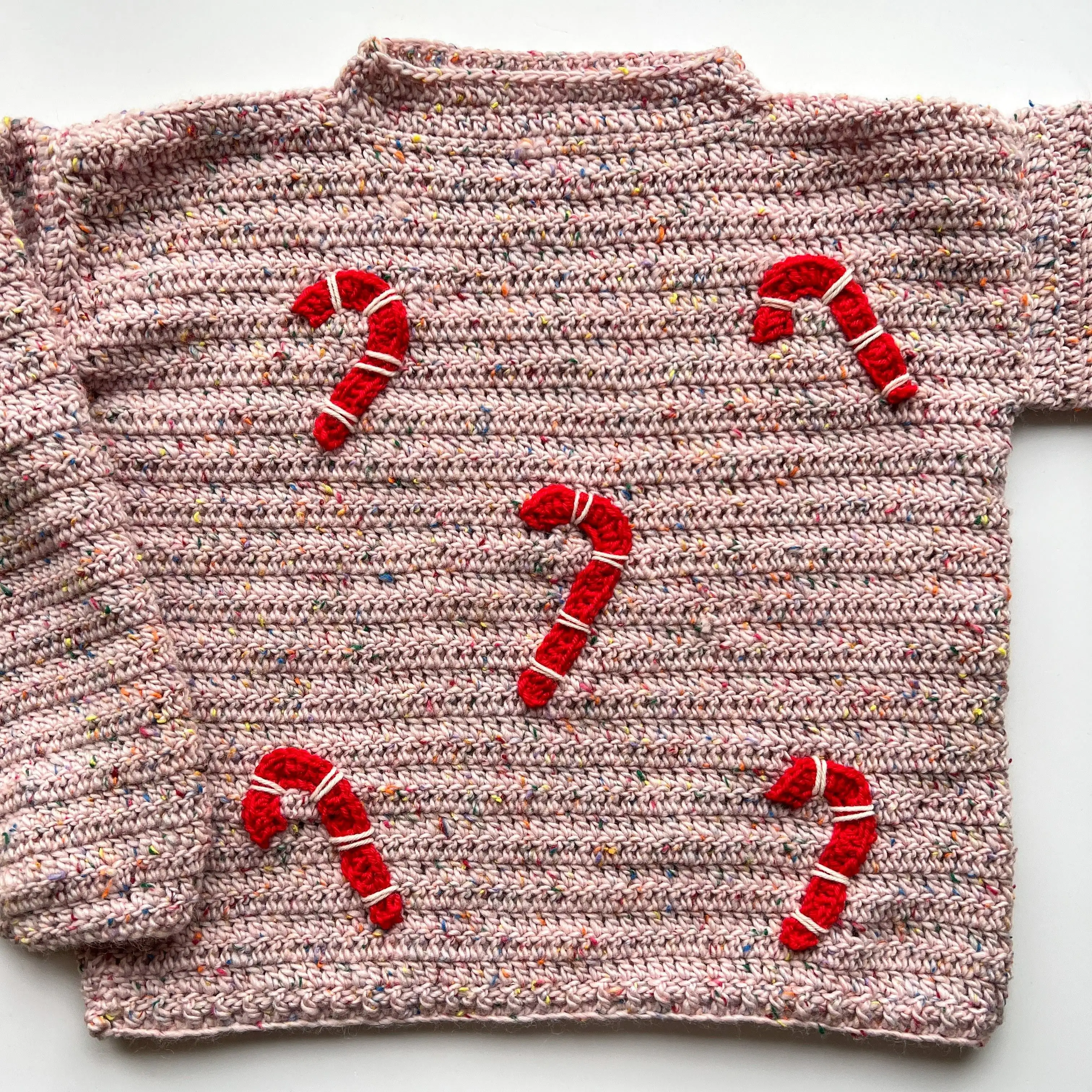 9100-candy-canes-sweater-1.webp