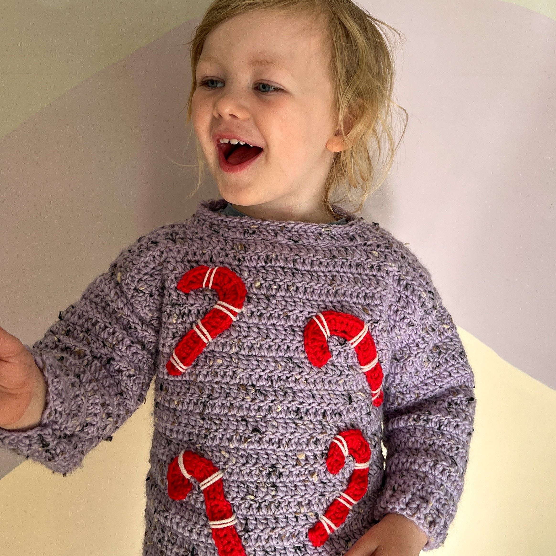 9110-candy-canes-children-s-sweater-1.webp